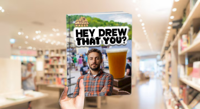 a hand holding a book of a cliche 30-something you'd find at a brewery